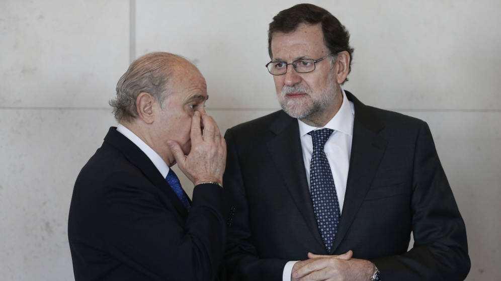 Mariano Rajoy y Jorge Fernández Díaz, en una imagen de archivo. / Efe